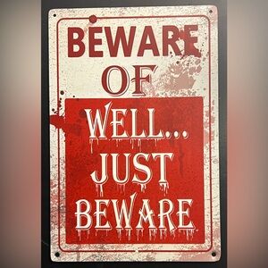 Beware: Tin bar sign